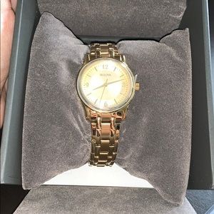 Women’s classic gold Bulova watch
